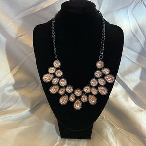 Iridescent and black necklace.